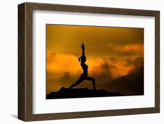 Silhouette of Woman Doing Yoga Meditation During Sunrise with Natural Golden Sunlight on Mountain-szefei-Framed Photographic Print