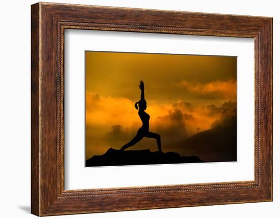 Silhouette of Woman Doing Yoga Meditation During Sunrise with Natural Golden Sunlight on Mountain-szefei-Framed Photographic Print