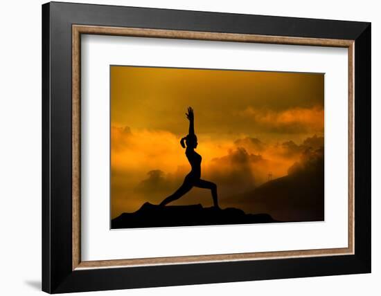 Silhouette of Woman Doing Yoga Meditation During Sunrise with Natural Golden Sunlight on Mountain-szefei-Framed Photographic Print