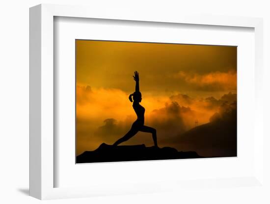 Silhouette of Woman Doing Yoga Meditation During Sunrise with Natural Golden Sunlight on Mountain-szefei-Framed Photographic Print