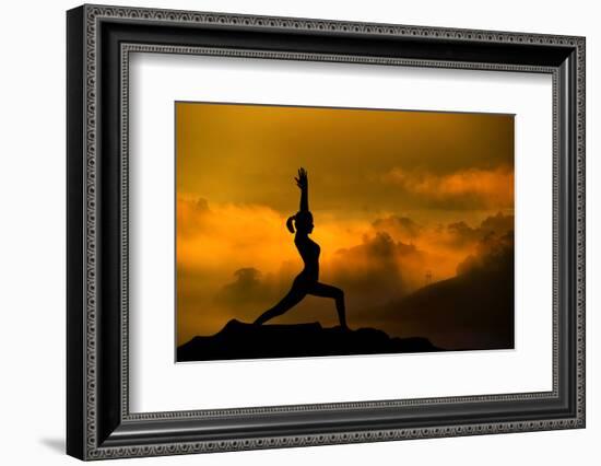 Silhouette of Woman Doing Yoga Meditation During Sunrise with Natural Golden Sunlight on Mountain-szefei-Framed Photographic Print