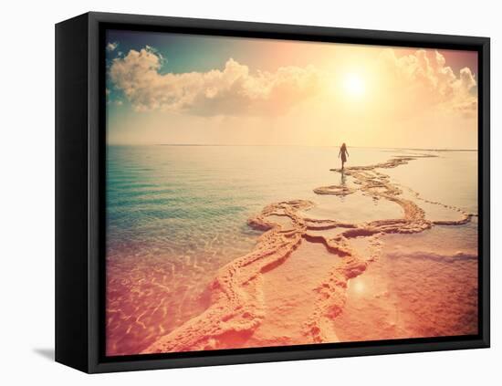 Silhouette of Young Woman Walking on Dead Sea at Sunrise-vvvita-Framed Premier Image Canvas