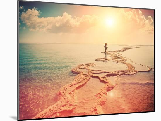 Silhouette of Young Woman Walking on Dead Sea at Sunrise-vvvita-Mounted Photographic Print