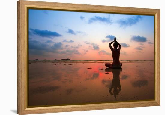 Silhouette Young Woman Practicing Yoga On The Beach At Sunset-De Visu-Framed Stretched Canvas