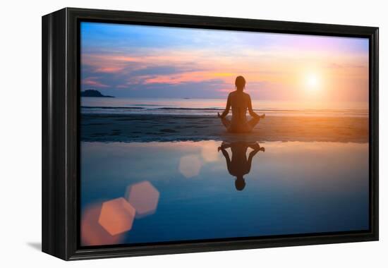 Silhouette Young Woman Practicing Yoga on the Beach at Sunset-De Visu-Framed Premier Image Canvas