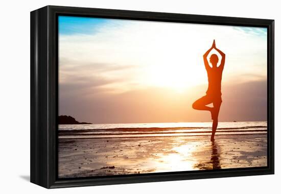 Silhouette Young Woman Practicing Yoga on the Beach at Sunset-De Visu-Framed Premier Image Canvas