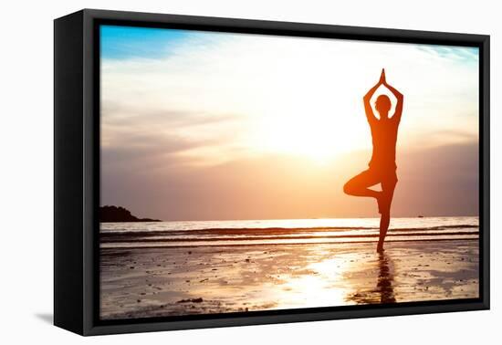 Silhouette Young Woman Practicing Yoga on the Beach at Sunset-De Visu-Framed Premier Image Canvas