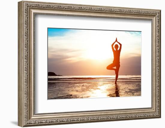 Silhouette Young Woman Practicing Yoga on the Beach at Sunset-De Visu-Framed Photographic Print