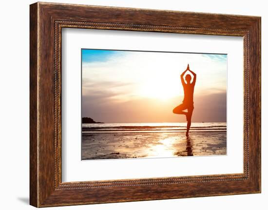 Silhouette Young Woman Practicing Yoga on the Beach at Sunset-De Visu-Framed Photographic Print