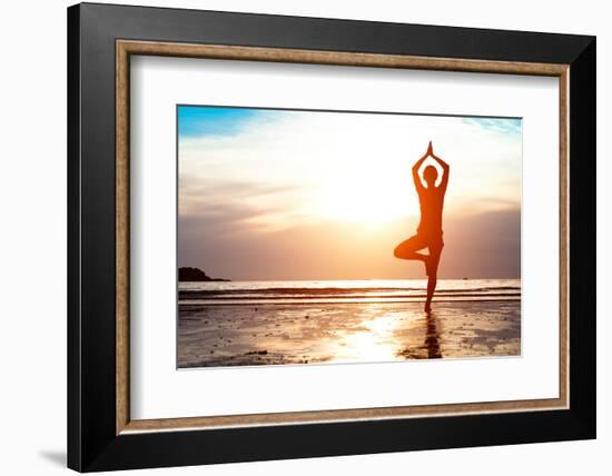 Silhouette Young Woman Practicing Yoga on the Beach at Sunset-De Visu-Framed Photographic Print