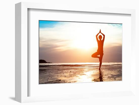 Silhouette Young Woman Practicing Yoga on the Beach at Sunset-De Visu-Framed Photographic Print