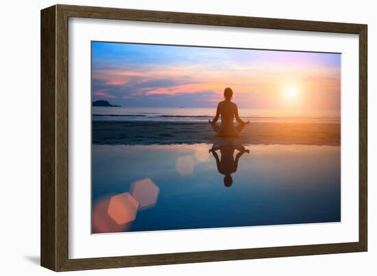 Silhouette Young Woman Practicing Yoga on the Beach at Sunset-De Visu-Framed Photographic Print