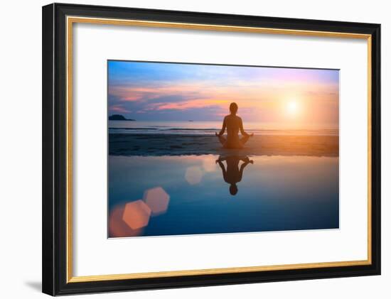 Silhouette Young Woman Practicing Yoga on the Beach at Sunset-De Visu-Framed Photographic Print