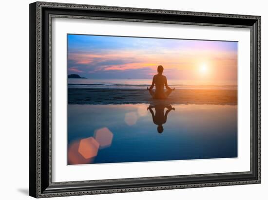 Silhouette Young Woman Practicing Yoga on the Beach at Sunset-De Visu-Framed Photographic Print