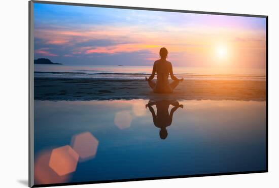 Silhouette Young Woman Practicing Yoga on the Beach at Sunset-De Visu-Mounted Photographic Print