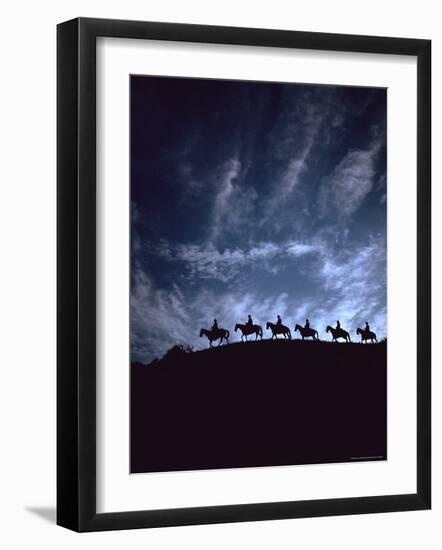 Silhouetted Cowboys During Round Up at Trinchera Ranch-Loomis Dean-Framed Photographic Print