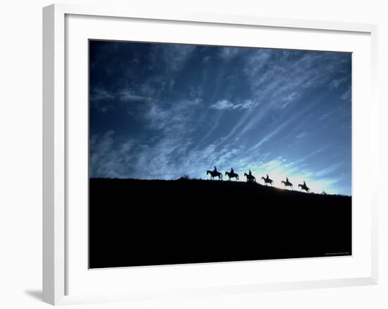 Silhouetted Cowboys During Round Up at Trinchera Ranch-Loomis Dean-Framed Photographic Print