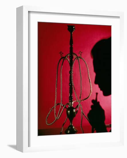 Silhouetted Man Smoking Cannabis From a Pipe-Tek Image-Framed Photographic Print