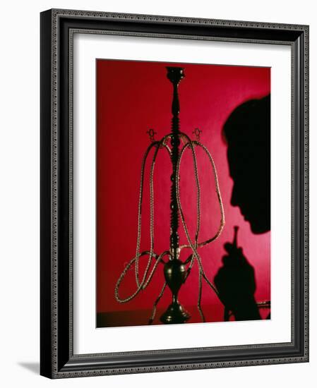 Silhouetted Man Smoking Cannabis From a Pipe-Tek Image-Framed Photographic Print