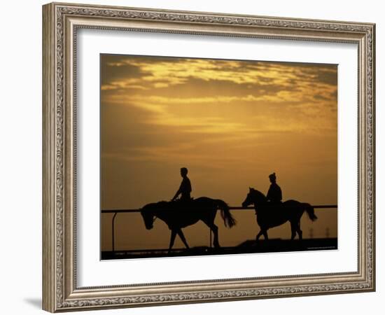 Silhouetted Men Riding on Horses, Dubai, UAE-Henry Horenstein-Framed Photographic Print