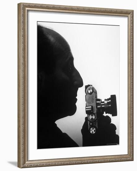 Silhouetted Profile of Photographer Alfred Eisenstaedt with a Camera-Alfred Eisenstaedt-Framed Premium Photographic Print