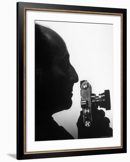 Silhouetted Profile of Photographer Alfred Eisenstaedt with a Camera-Alfred Eisenstaedt-Framed Premium Photographic Print