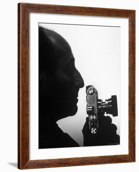 Silhouetted Profile of Photographer Alfred Eisenstaedt with a Camera-Alfred Eisenstaedt-Framed Premium Photographic Print