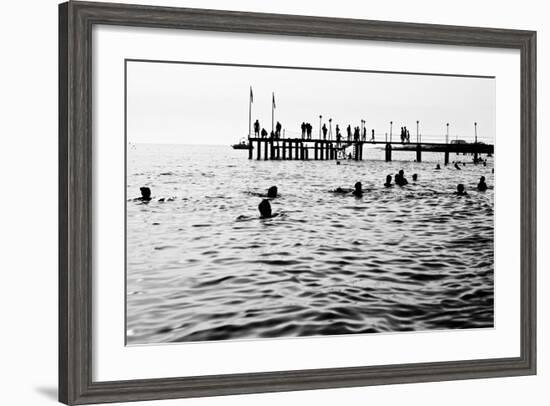 Silhouettes of Having a Rest People. it is Black a White Photo of a Sea Pier and Having a Rest Peop-Mikhail hoboton Popov-Framed Photographic Print