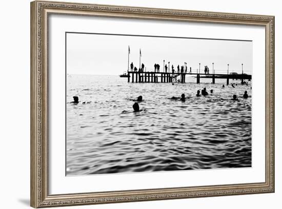Silhouettes of Having a Rest People. it is Black a White Photo of a Sea Pier and Having a Rest Peop-Mikhail hoboton Popov-Framed Photographic Print