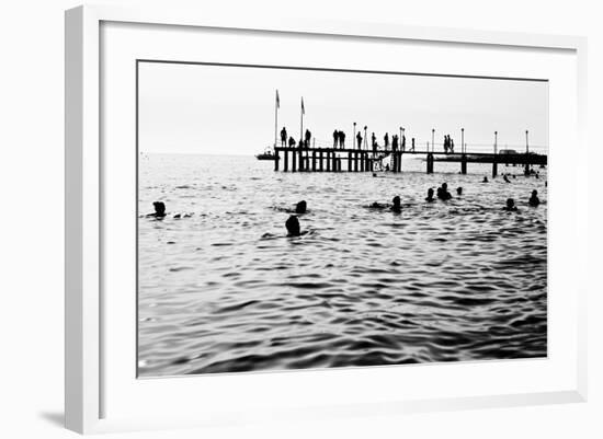 Silhouettes of Having a Rest People. it is Black a White Photo of a Sea Pier and Having a Rest Peop-Mikhail hoboton Popov-Framed Photographic Print