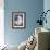 Silver Shell on Indigo Blue I-Caroline Kelly-Framed Art Print displayed on a wall