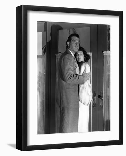 SINGAPORE, 1947 directed by JOHN BRAHM Fred MacMurray and Ava Gardner (b/w photo)-null-Framed Photo
