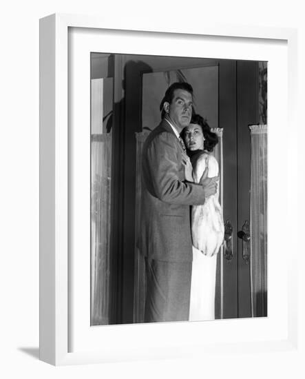 SINGAPORE, 1947 directed by JOHN BRAHM Fred MacMurray and Ava Gardner (b/w photo)-null-Framed Photo