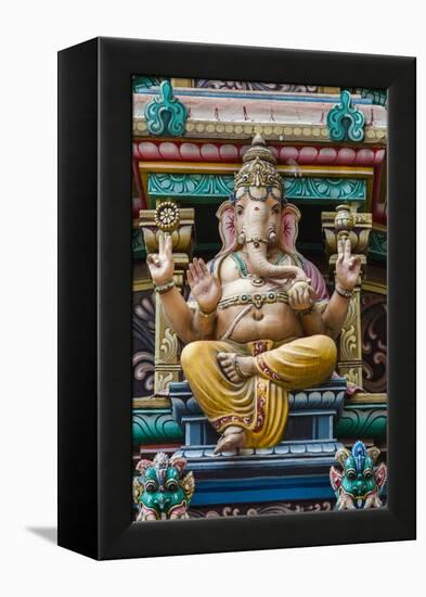 Singapore, Chinatown, Sri Mariamman Hindu Temple, Detail of Hindu Deity, Ganesh-Walter Bibikow-Framed Premier Image Canvas