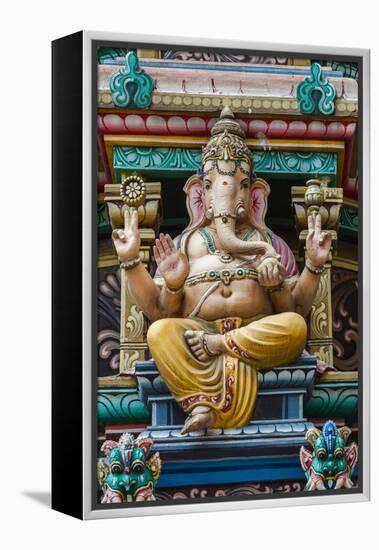 Singapore, Chinatown, Sri Mariamman Hindu Temple, Detail of Hindu Deity, Ganesh-Walter Bibikow-Framed Premier Image Canvas