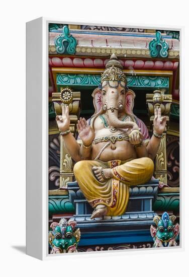 Singapore, Chinatown, Sri Mariamman Hindu Temple, Detail of Hindu Deity, Ganesh-Walter Bibikow-Framed Premier Image Canvas