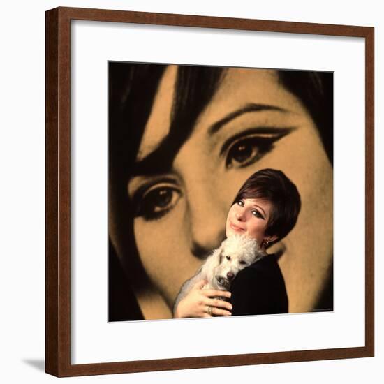 Singer and Actress Barbra Streisand Holding Small Dog in Her Arms-Bill Eppridge-Framed Premium Photographic Print