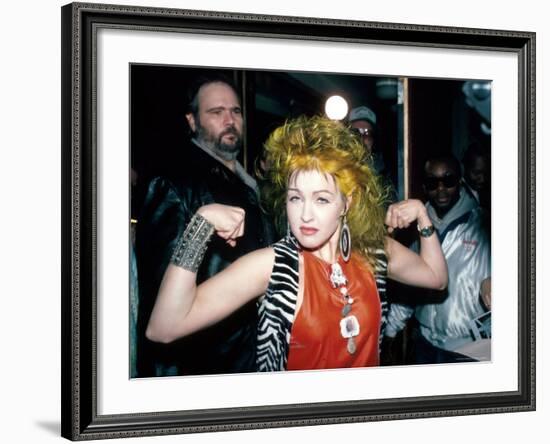 Singer Cyndi Lauper Flexing Her Muscles-Ann Clifford-Framed Premium Photographic Print