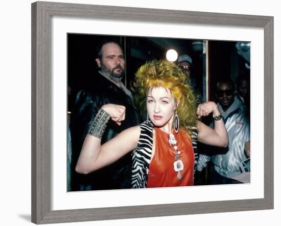 Singer Cyndi Lauper Flexing Her Muscles-Ann Clifford-Framed Premium Photographic Print