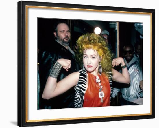 Singer Cyndi Lauper Flexing Her Muscles-Ann Clifford-Framed Premium Photographic Print