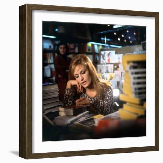 Singer Dalida in a Bookshop, C. 1968-null-Framed Photo