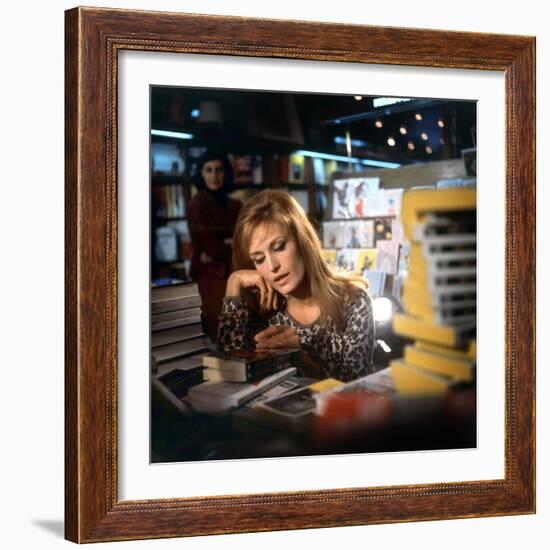 Singer Dalida in a Bookshop, C. 1968-null-Framed Photo