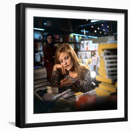 Singer Dalida in a Bookshop, C. 1968-null-Framed Photo
