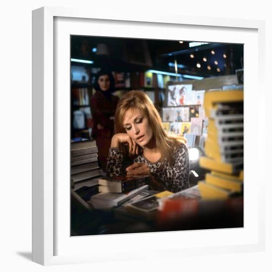 Singer Dalida in a Bookshop, C. 1968-null-Framed Photo