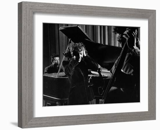 Singer Edith Piaf Holding Her Hands to Her Head While Performing with Pianist and Bass Player-Gjon Mili-Framed Premium Photographic Print