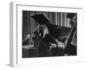 Singer Edith Piaf Holding Her Hands to Her Head While Performing with Pianist and Bass Player-Gjon Mili-Framed Premium Photographic Print