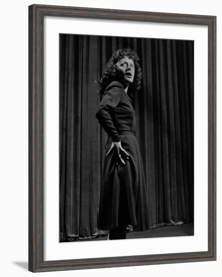 Singer Edith Piaf with Hands on Hips, Standing on Stage-Gjon Mili-Framed Premium Photographic Print