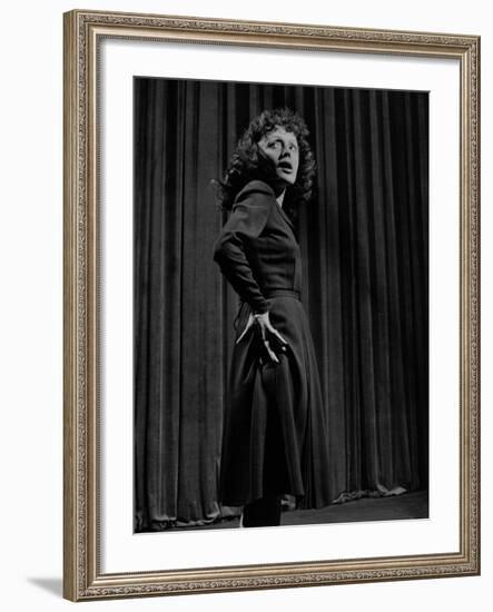 Singer Edith Piaf with Hands on Hips, Standing on Stage-Gjon Mili-Framed Premium Photographic Print