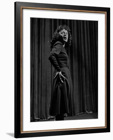 Singer Edith Piaf with Hands on Hips, Standing on Stage-Gjon Mili-Framed Premium Photographic Print