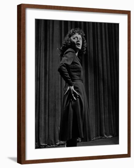 Singer Edith Piaf with Hands on Hips, Standing on Stage-Gjon Mili-Framed Premium Photographic Print